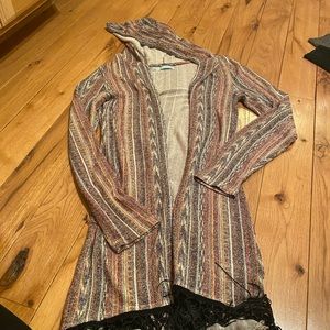 Long cardigan with fringe bottom